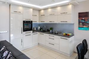 Kuchyňa alebo kuchynka v ubytovaní Apartament PAULA Zakopane