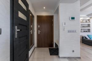 Posteľ alebo postele v izbe v ubytovaní Apartament PAULA Zakopane