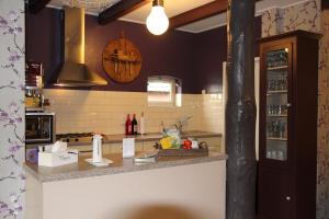 Kuchyň nebo kuchyňský kout v ubytování 't Rond Bargie