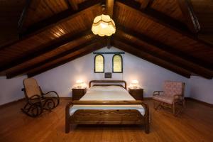 A bed or beds in a room at The Old Mansion