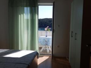 Gallery image of Apartment in Kampor with sea view, terrace, air conditioning, Wi-Fi (4610-4) in Kampor