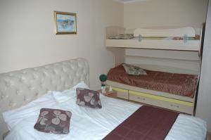 Postel nebo postele na pokoji v ubytování Guest House Maja