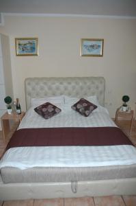 Postel nebo postele na pokoji v ubytování Guest House Maja
