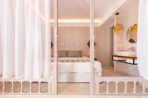 Aegean Village Beachfront Resort客房内的一张或多张床位