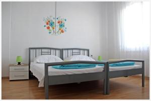 En eller flere senge i et værelse på Apartment in Slatine with sea view, terrace, air conditioning, Wi-Fi (4782-2)
