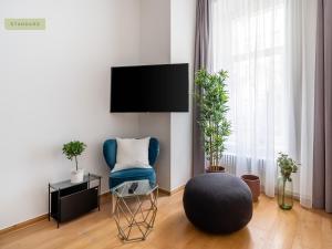 TV a/nebo společenská místnost v ubytování Apartment Berlin Paul-Robeson-Straße