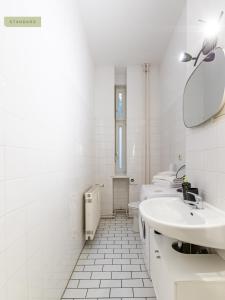 Ванная комната в Apartments Berlin Niederbarnimstraße