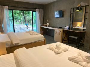 Postel nebo postele na pokoji v ubytování Blues River Resort