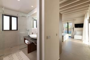 A bed or beds in a room at South Key Villa