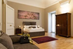 Posteľ alebo postele v izbe v ubytovaní Divisi Suites & SPA