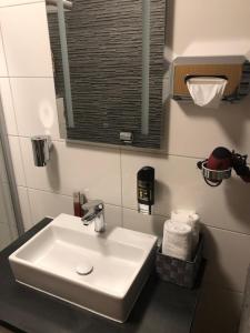Koupelna v ubytování Hotel am Brünnchen