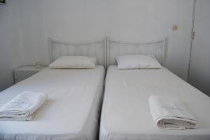 Postel nebo postele na pokoji v ubytování Grandma Vasiliki Rooms To Let