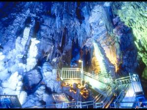 a group of people standing inside of a cave at Hotel Wing International Sukagawa in Sukagawa