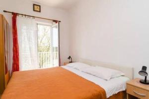 Posteľ alebo postele v izbe v ubytovaní Apartments Felix