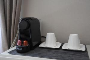 Príslušenstvo na prípravu kávy alebo čaju v ubytovaní Bajamonti 5 Luxury Rooms