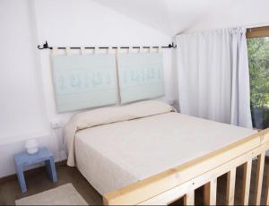 Postel nebo postele na pokoji v ubytování Via dei Mari Guest House