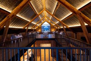 an inside view of a building with a large window at Aurora Borealis Observatory in Silsand