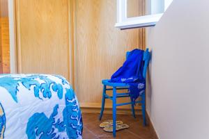 A bed or beds in a room at Casa Fendemare, vista sul golfo IUNQ2620
