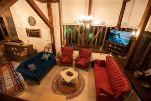 an overhead view of a living room with a tv at KÜRKÇÜ KONAK in Safranbolu