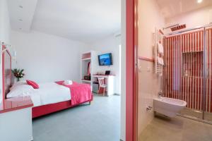 Postel nebo postele na pokoji v ubytování Al Campanile