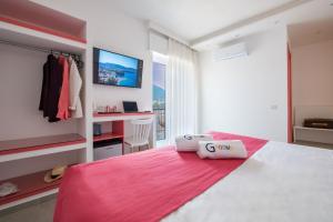 Postel nebo postele na pokoji v ubytování Al Campanile