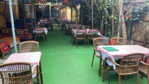 a row of tables and chairs on a patio at Garden House in Istanbul
