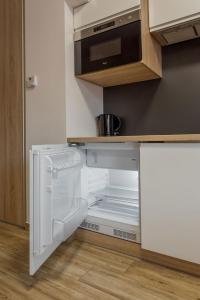 Kuchnia lub aneks kuchenny w obiekcie K2 Apartamenty