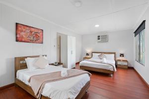 Una cama o camas en una habitación de Gazebo Motor Inn - Strathmerton