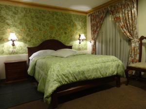 מיטה או מיטות בחדר ב-Cerro Rico