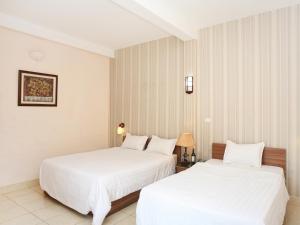 Voodi või voodid majutusasutuse Especen Hotel toas