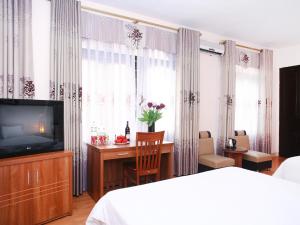 TV a/nebo společenská místnost v ubytování Especen Hotel + 26 fotografií