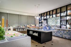 A kitchen or kitchenette at Eurostars Torre Sevilla