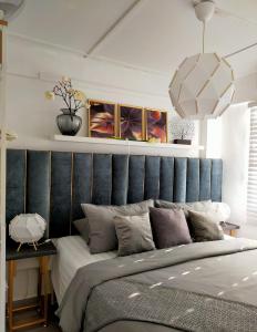 Postel nebo postele na pokoji v ubytování Maya Homestay Putrajaya @ Twelve