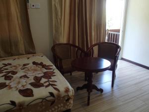 Ein Bett oder Betten in einem Zimmer der Unterkunft Redang De' Rimba