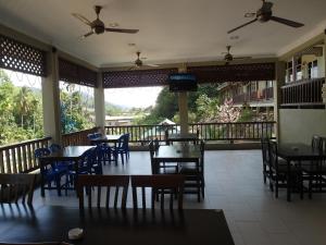 Ein Restaurant oder anderes Speiselokal in der Unterkunft Redang De' Rimba 