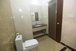 Koupelna v ubytování Hotel Nilay Residency