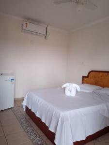 Posteľ alebo postele v izbe v ubytovaní Pousada 4 Estações