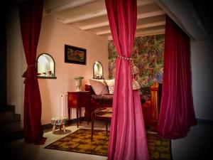 Posezení v ubytování Alfred et George - Le Gîte