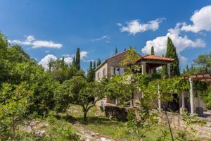 Vonkajšia záhrada v ubytovaní Sleep & Fly Cottage