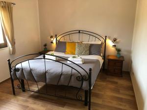 Postel nebo postele na pokoji v ubytování B&B Mandorla Amara