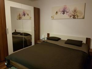 Posteľ alebo postele v izbe v ubytovaní Apartmán Lipno 50