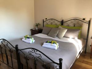 Postel nebo postele na pokoji v ubytování B&B Mandorla Amara