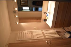 Ванна кімната в Appartement Duplex RS Tursan Pour 5 Personnes Proche De La Plage Des Bourdaines