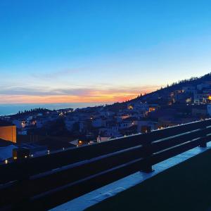 a view of a city from a bridge at sunset at La Casa de Vilaflor in Vilaflor