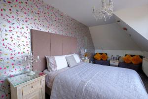 Cama ou camas em um quarto em Robertsbrook Guest House