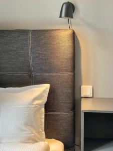 Postel nebo postele na pokoji v ubytování Unique Hotel Jungfrugatan
