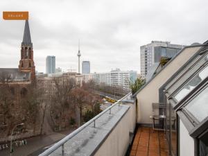 a view of a city from the balcony of a building at Apartment Berlin Am Friedrichshain in Berlin