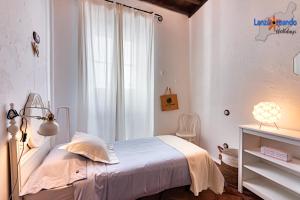 Posteľ alebo postele v izbe v ubytovaní Vivienda Vacacional El Patio de Franky