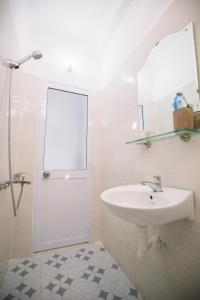 Koupelna v ubytování Lum Dong Tien Hotel