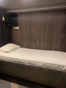 A bed or beds in a room at Хостел ХАН